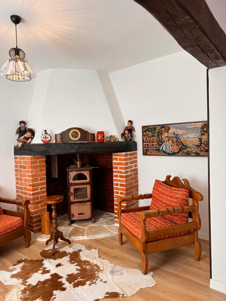 Traditional fireplace inside Per Mik Cottage